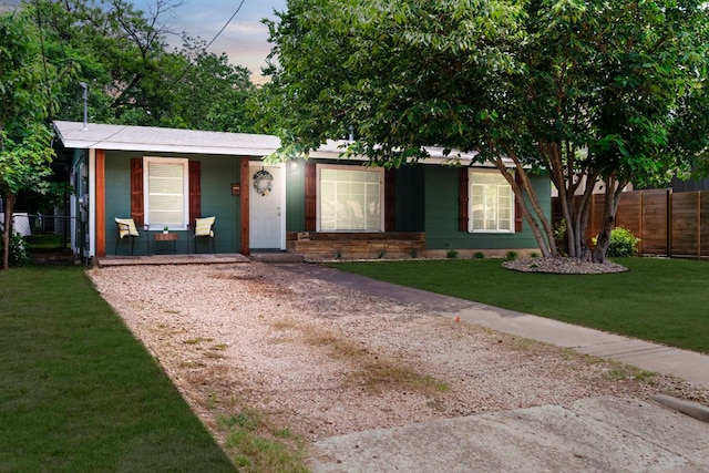 1040 Rosemont St, Austin, TX 78723 - view of front of home featuring a porch and driveway