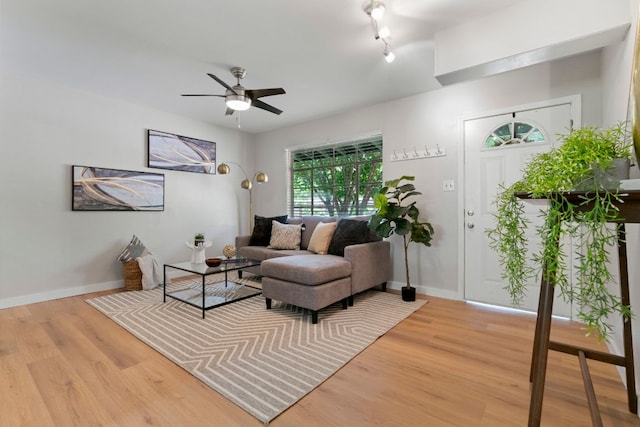 1040 Rosemont St, Austin, TX 78723 - living area featuring light wood finished floors and a ceiling fan