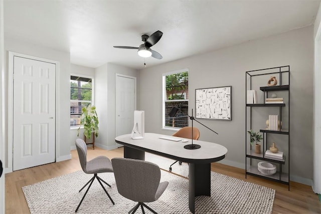 1040 Rosemont St, Austin, TX 78723 - office area with light wood finished floors, healthy amount of natural light, and ceiling fan