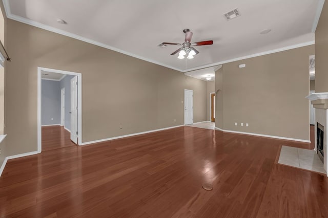 202 Muscovy Ln, Cedar Park, TX 78613 - unfurnished living room with ceiling fan, crown molding, wood finished floors, and a fireplace with flush hearth