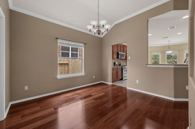 202 Muscovy Ln, Cedar Park, TX 78613 - spare room featuring wood finished floors, ornamental molding, a chandelier, and lofted ceiling
