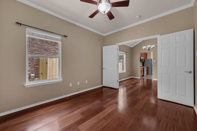 202 Muscovy Ln, Cedar Park, TX 78613 - spare room featuring wood finished floors, a chandelier, ceiling fan, and ornamental molding