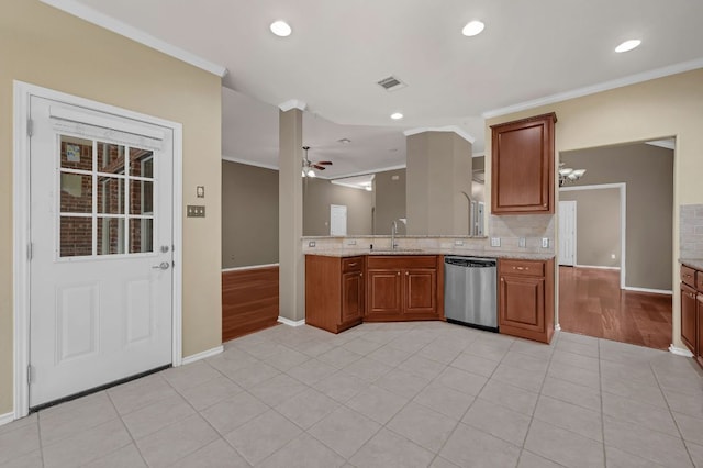 202 Muscovy Ln, Cedar Park, TX 78613 - kitchen featuring dishwasher, crown molding, decorative backsplash, brown cabinetry, and ceiling fan