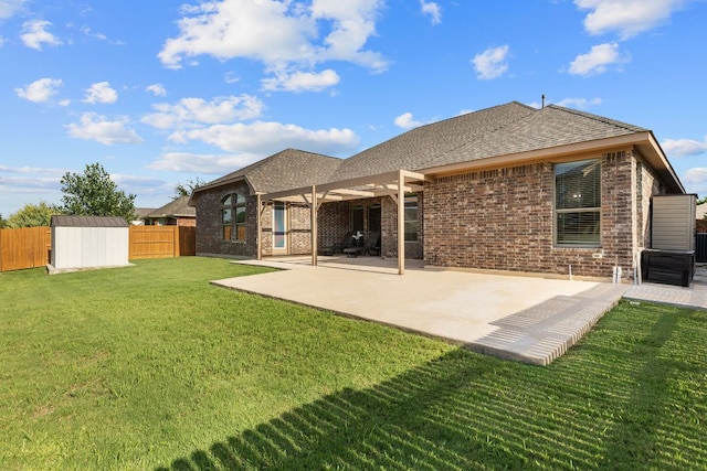 2707 Saint Paul Rivera Ln, Round Rock, TX 78665 - back of property featuring brick siding, a storage shed, and a fenced backyard
