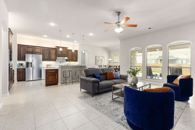 2707 Saint Paul Rivera Ln, Round Rock, TX 78665 - living area featuring a ceiling fan, light tile patterned floors, and recessed lighting