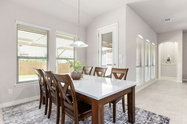 2707 Saint Paul Rivera Ln, Round Rock, TX 78665 - dining area featuring arched walkways and light tile patterned flooring