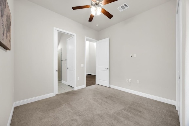 14016 Tyburn Trl, Austin, TX 78717 - unfurnished bedroom with carpet, ensuite bathroom, and ceiling fan