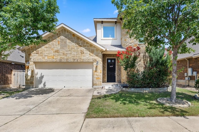 14016 Tyburn Trl, Austin, TX 78717 - view of front facade featuring stone siding, a garage, driveway, and a front lawn