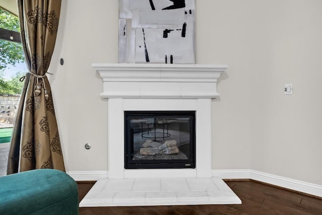 14016 Tyburn Trl, Austin, TX 78717 - detailed view of wood finished floors and a glass covered fireplace