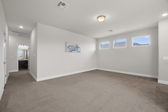 14016 Tyburn Trl, Austin, TX 78717 - empty room with carpet and recessed lighting