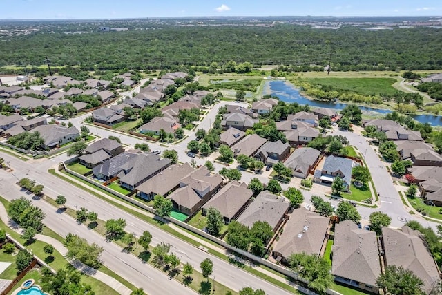 14016 Tyburn Trl, Austin, TX 78717 - aerial perspective of suburban area featuring a heavily wooded area and a large body of water