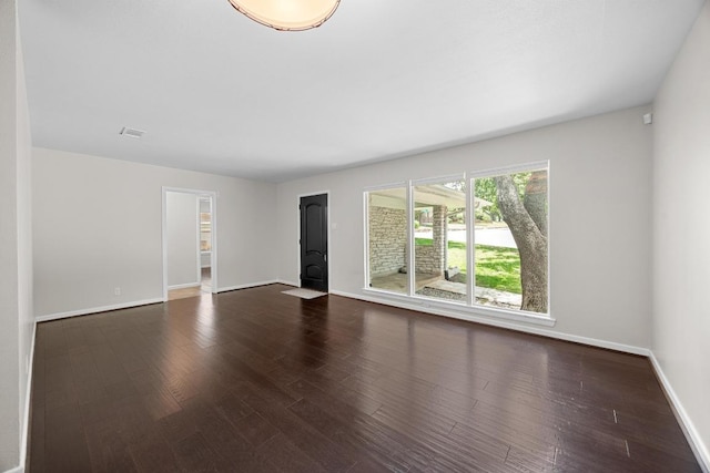 3518 Lakeland Dr, Austin, TX 78731 - unfurnished living room featuring dark wood-style floors