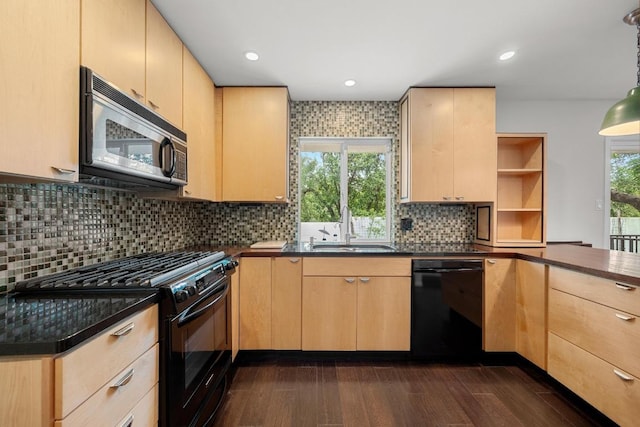 3518 Lakeland Dr, Austin, TX 78731 - kitchen featuring black appliances, light brown cabinetry, dark countertops, dark wood-type flooring, and backsplash