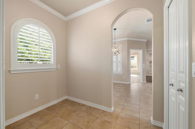 811 River Walk Trl, Georgetown, TX 78633 - corridor with ornamental molding, light tile patterned flooring, and arched walkways