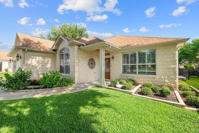 811 River Walk Trl, Georgetown, TX 78633 - ranch-style house featuring a shingled roof and stone siding