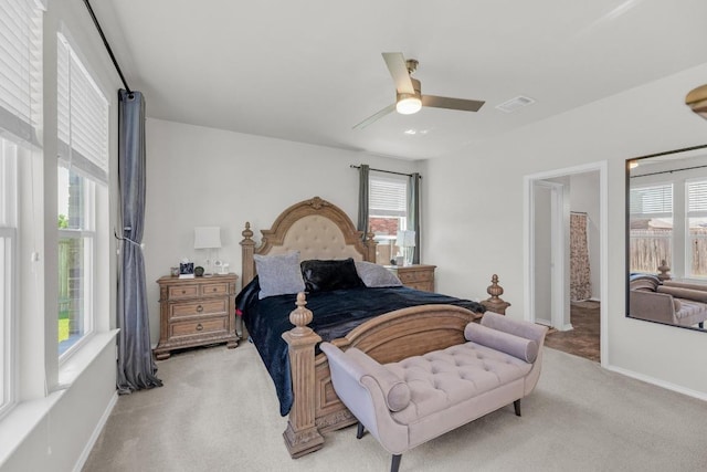 136 Everglades Ave, Taylor, TX 76574 - carpeted bedroom with a ceiling fan and baseboards