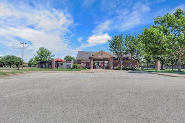 136 Everglades Ave, Taylor, TX 76574 - view of front facade featuring uncovered parking