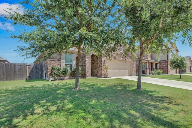 136 Everglades Ave, Taylor, TX 76574 - view of property hidden behind natural elements with concrete driveway, brick siding, and an attached garage
