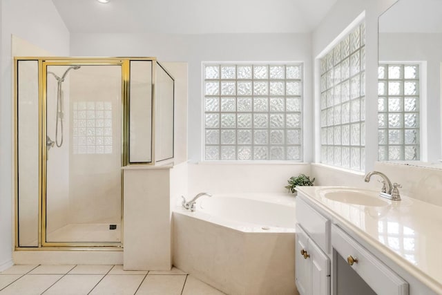 4917 Flaming Oak Cv, Austin, TX 78749 - full bathroom with vanity, a bath, a shower stall, and plenty of natural light