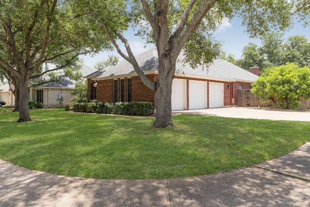 4917 Flaming Oak Cv, Austin, TX 78749 - ranch-style house with an attached garage, driveway, brick siding, and a shingled roof