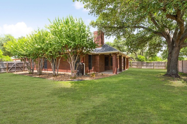 4917 Flaming Oak Cv, Austin, TX 78749 - fenced backyard with a patio area