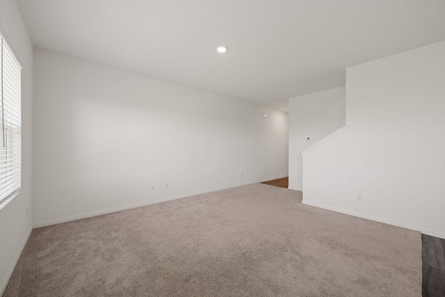 701 Redfish Ln, Hutto, TX 78634 - carpeted empty room featuring recessed lighting and baseboards