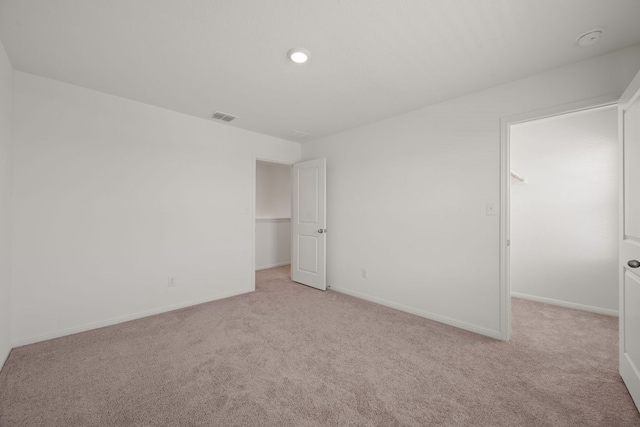 701 Redfish Ln, Hutto, TX 78634 - unfurnished bedroom with carpet and a spacious closet