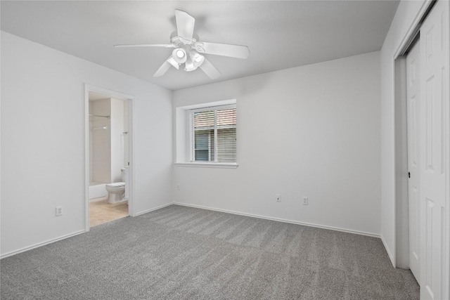 1102 Peyton Pl, Cedar Park, TX 78613 - unfurnished bedroom featuring a closet, carpet flooring, ensuite bath, and a ceiling fan