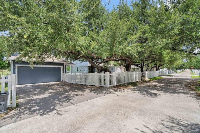 1102 Peyton Pl, Cedar Park, TX 78613 - view of property hidden behind natural elements featuring driveway and a fenced front yard