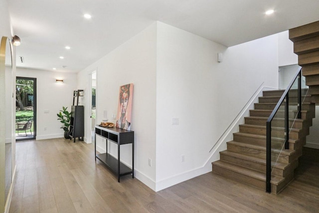 5700 Louise Ln, Austin, TX 78757 - stairway featuring wood finished floors and recessed lighting