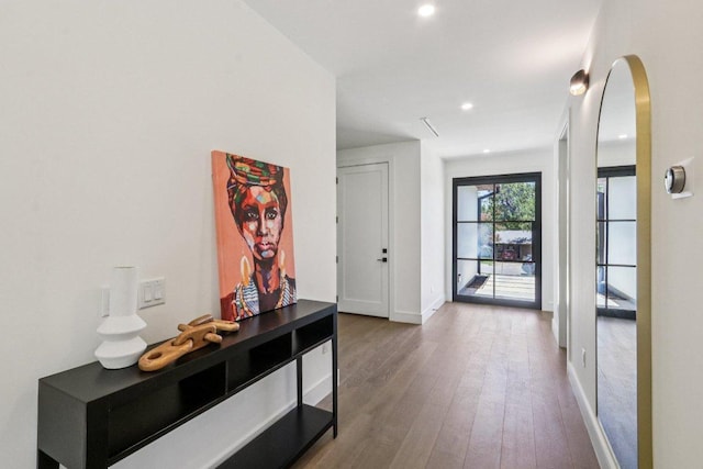 5700 Louise Ln, Austin, TX 78757 - hall featuring wood finished floors, recessed lighting, and arched walkways