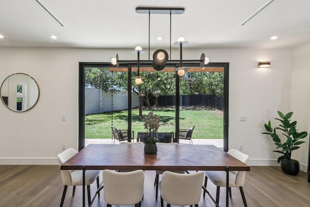 5700 Louise Ln, Austin, TX 78757 - dining area featuring a chandelier, recessed lighting, and wood finished floors