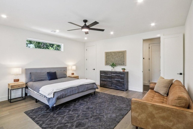 5700 Louise Ln, Austin, TX 78757 - bedroom featuring wood finished floors, recessed lighting, and ceiling fan