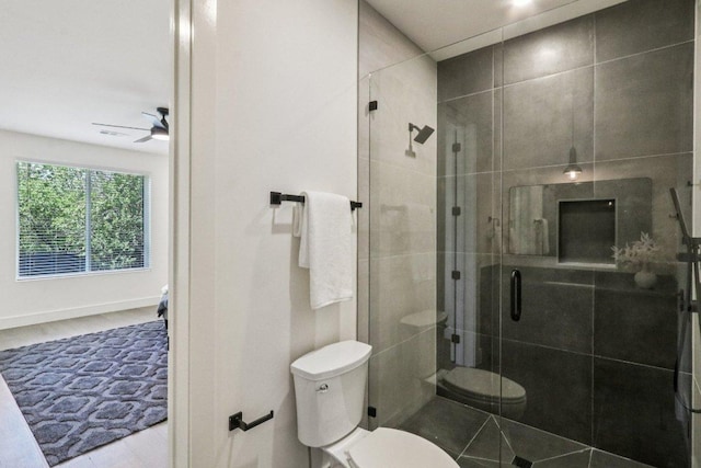 5700 Louise Ln, Austin, TX 78757 - full bathroom with a stall shower and a ceiling fan