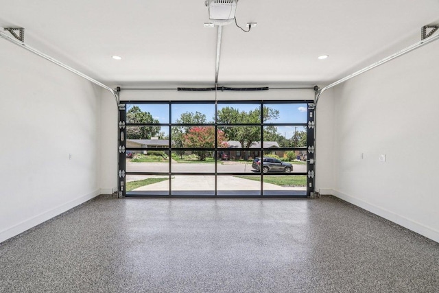 5700 Louise Ln, Austin, TX 78757 - garage with baseboards and recessed lighting