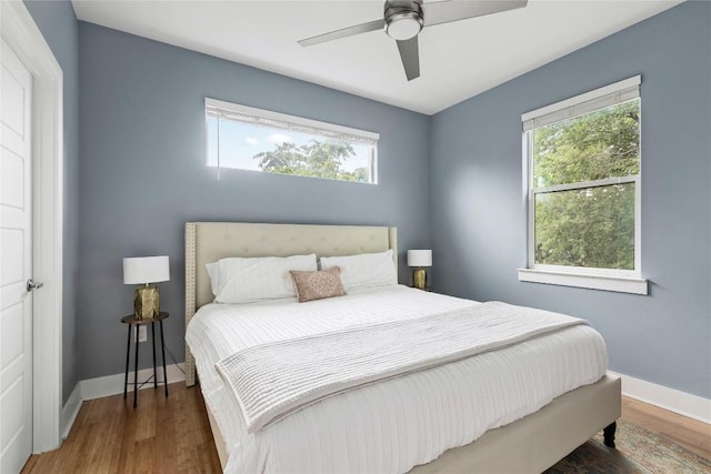7606 Providence Ave Unit B, Austin, TX 78752 - bedroom featuring wood finished floors and a ceiling fan