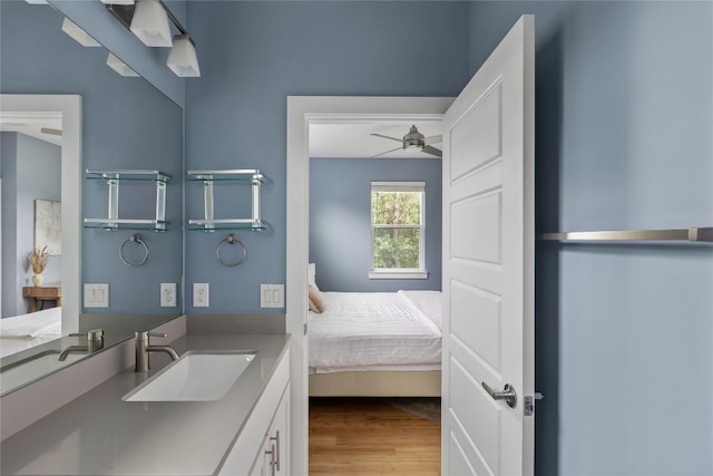 7606 Providence Ave Unit B, Austin, TX 78752 - bedroom with a sink and wood finished floors