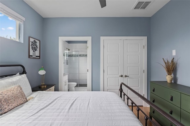 7606 Providence Ave Unit B, Austin, TX 78752 - bedroom with a closet, ensuite bathroom, and a ceiling fan
