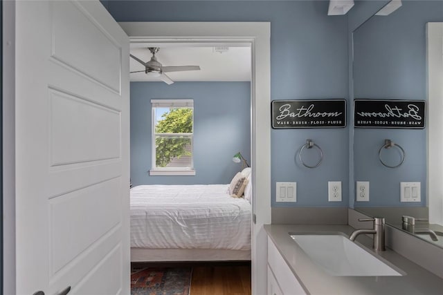 7606 Providence Ave Unit B, Austin, TX 78752 - bedroom with wood finished floors and ceiling fan