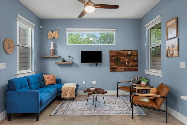 7606 Providence Ave Unit B, Austin, TX 78752 - living room with ceiling fan and baseboards