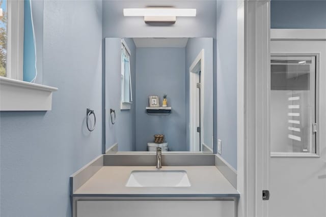7606 Providence Ave Unit B, Austin, TX 78752 - bathroom featuring vanity and toilet