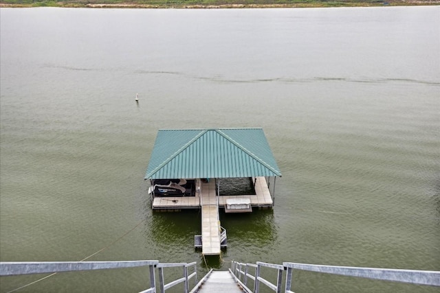 dock area featuring a water view and boat lift