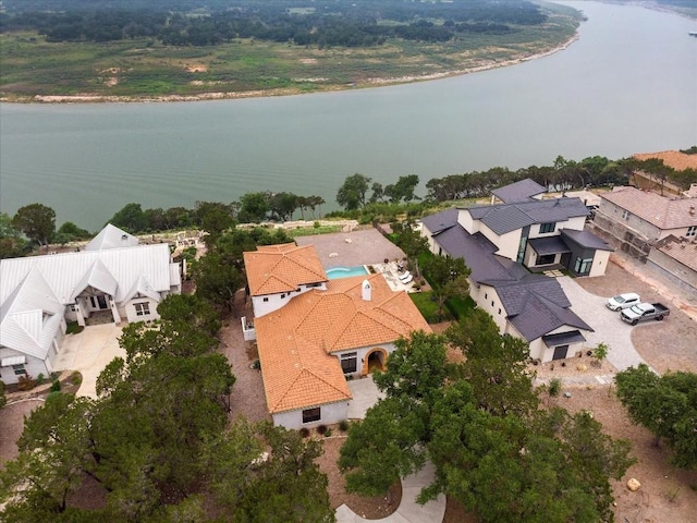 aerial perspective of suburban area featuring a large body of water