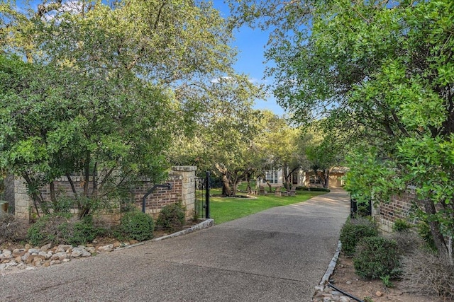 17120 Northlake Hills Dr, Jonestown, TX 78645 - view of home's community featuring a yard and driveway