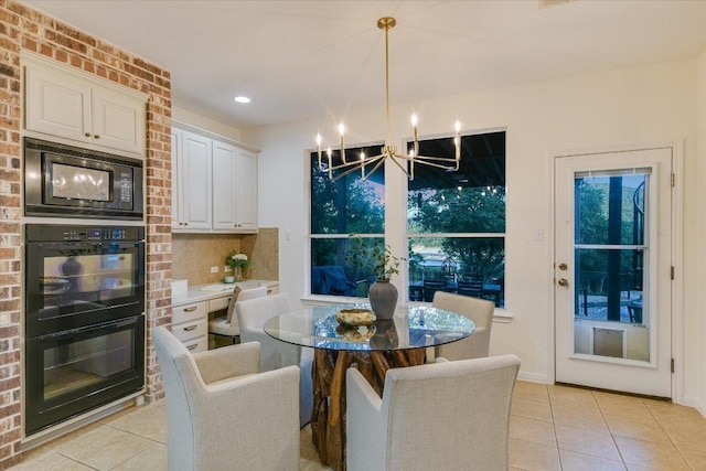 17120 Northlake Hills Dr, Jonestown, TX 78645 - dining area with a chandelier and light tile patterned flooring