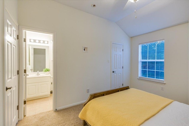 17120 Northlake Hills Dr, Jonestown, TX 78645 - bedroom with vaulted ceiling, connected bathroom, and light colored carpet