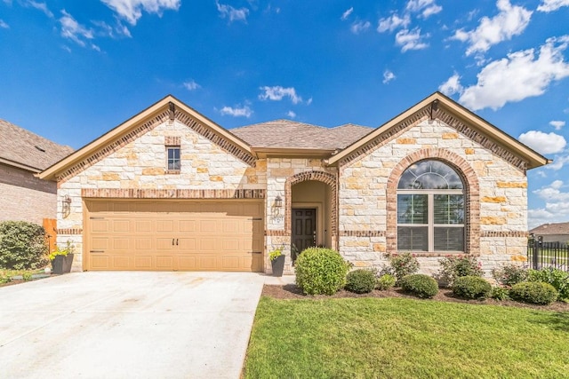 7901 Sunrise Ravine Pass, Lago Vista, TX 78645 - french country inspired facade featuring stone siding, a garage, and concrete driveway