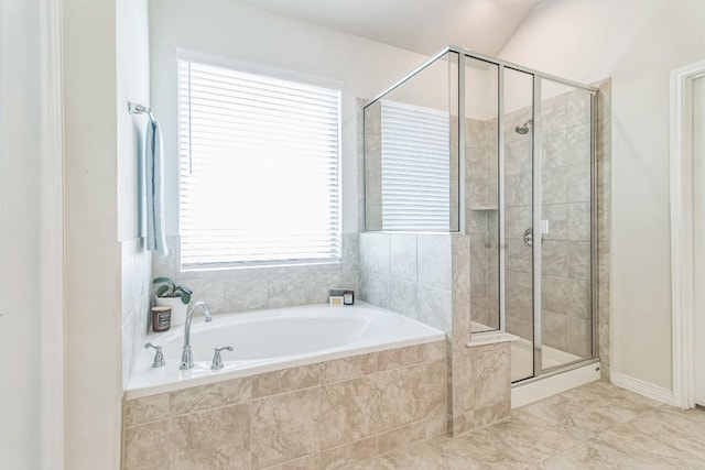 7901 Sunrise Ravine Pass, Lago Vista, TX 78645 - bathroom featuring a garden tub and a shower stall
