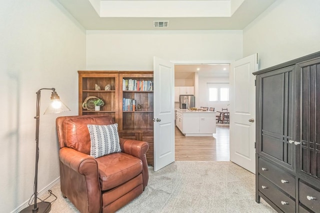7901 Sunrise Ravine Pass, Lago Vista, TX 78645 - sitting room featuring light colored carpet