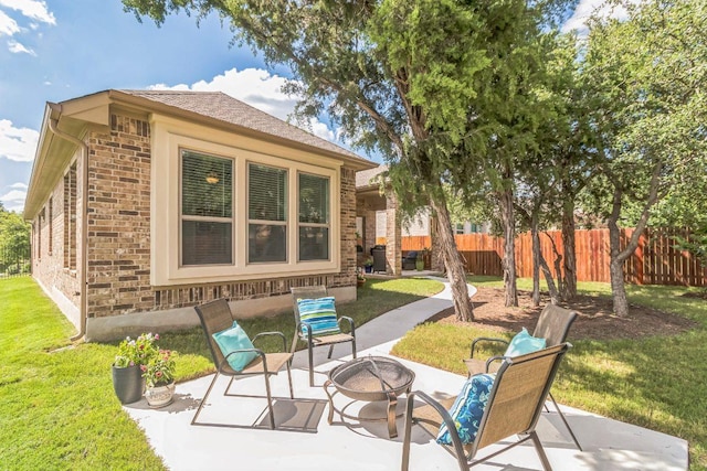 7901 Sunrise Ravine Pass, Lago Vista, TX 78645 - view of patio / terrace featuring a fire pit